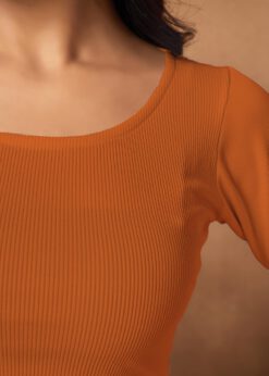 Minimalist style inspiration featuring a classic orange ribbed scoop neck crop top with a V-hemline