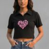 Sweet Hearts Ribbed Polo Crop Top in black, featuring a pink graphic print and a classic polo collar