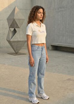 Stylish white waffle-knit polo crop top for women with a 'GLORY' crown graphic print