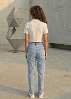 Stylish white waffle-knit polo crop top for women with a 'GLORY' crown graphic print